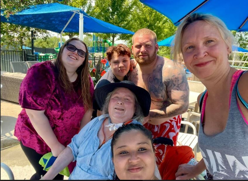 Janet with family at pool